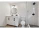 Modern bathroom featuring a double sink vanity, stylish fixtures, and a sleek walk-in shower at 4451 Flat Shoals, Decatur, GA 30034