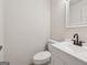 Powder room featuring a modern vanity, an undermount sink with sleek, black faucet, and a decorative mirror at 4451 Flat Shoals, Decatur, GA 30034