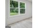 Bedroom with lots of natural light and light-colored floors at 4451 Flat Shoals, Decatur, GA 30034