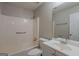 Clean bathroom with tub and shower combo and modern vanity sink at 6200 Beaver Creek Trl, Atlanta, GA 30349