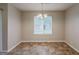 Charming dining area with tiled floors, abundant natural light, and a decorative chandelier at 6200 Beaver Creek Trl, Atlanta, GA 30349