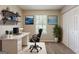 Functional office space with desk, shelves, and good natural light for productivity at 6200 Beaver Creek Trl, Atlanta, GA 30349
