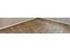 Close up of carpeted flooring with white baseboards and neutral wall paint at 1105 Buckhurst Dr, Atlanta, GA 30349