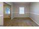 Inviting living area with neutral walls and carpet and natural light at 1105 Buckhurst Dr, Atlanta, GA 30349