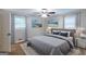 Serene main bedroom features a plush queen-sized bed and ample natural light at 1105 Buckhurst Dr, Atlanta, GA 30349