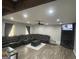 Spacious living room features hardwood floors, recessed lighting, and a modern ceiling fan at 176 Avalon Way, Riverdale, GA 30274