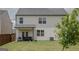 Spacious backyard featuring a patio area, lush lawn, and privacy fencing at 2159 Redfern, Dacula, GA 30019
