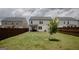 Large, private backyard with ample green space and newly planted trees at 2159 Redfern, Dacula, GA 30019