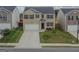 Charming two-story home featuring a brick facade, well-manicured lawn, and a two-car garage, perfect for families at 2159 Redfern, Dacula, GA 30019