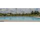 A community pool surrounded by lounge chairs for relaxing by the water at 2159 Redfern, Dacula, GA 30019