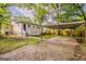Home backyard with a carport, a fenced yard, and a stairway to the back door at 2245 Dauphine St, Atlanta, GA 30344