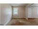 Bedroom with neutral walls, carpet floors, and windows for natural light at 2245 Dauphine St, Atlanta, GA 30344