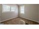 Bedroom with two windows offering natural light and neutral walls, plus carpet at 2245 Dauphine St, Atlanta, GA 30344