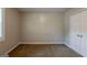 Bedroom with neutral walls, brown carpet, and a closet at 2245 Dauphine St, Atlanta, GA 30344