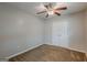 Bedroom featuring carpet floors, closet, ceiling fan, and window with natural light at 2245 Dauphine St, Atlanta, GA 30344