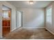 Cozy bedroom with carpet, good natural light, and seamless flow to other spaces in the home at 2245 Dauphine St, Atlanta, GA 30344