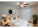 Comfortable bedroom with a ceiling fan, closet, and stylish decor at 2245 Dauphine St, Atlanta, GA 30344