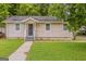 Charming single-story home with a well-maintained lawn and inviting front entrance at 2245 Dauphine St, Atlanta, GA 30344