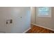 Laundry room connections with hard wood floor and natural light at 2245 Dauphine St, Atlanta, GA 30344