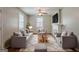 Cozy living room with ample seating, fireplace, and a neutral color palette at 2245 Dauphine St, Atlanta, GA 30344
