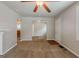 Inviting living room with neutral walls, carpet floors and seamless flow to other spaces at 2245 Dauphine St, Atlanta, GA 30344