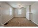 Bright living room featuring carpet floors, a ceiling fan, and a classic decorative fireplace at 2245 Dauphine St, Atlanta, GA 30344