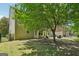 Spacious backyard featuring a patio, tree, and basketball hoop at 826 Richmond Cir, Peachtree City, GA 30269