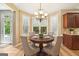 Cozy breakfast nook with large windows and a comfortable seating area bathed in natural light at 826 Richmond Cir, Peachtree City, GA 30269