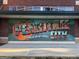 Colorful mural in the style of a postcard saying Greetings from Peachtree City at 826 Richmond Cir, Peachtree City, GA 30269