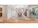 Formal dining room with hardwood floors, rug, chandelier, and plenty of natural light at 826 Richmond Cir, Peachtree City, GA 30269
