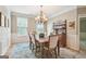 Formal dining room with classic decor, traditional furnishings, and an inviting atmosphere for gatherings at 826 Richmond Cir, Peachtree City, GA 30269
