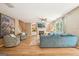 Spacious living room with hardwood floors, a fireplace, and large windows at 826 Richmond Cir, Peachtree City, GA 30269