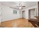 Spacious bedroom with hardwood floors and ample closet space, including built-in shelving at 3123 Deshong Dr, Stone Mountain, GA 30087