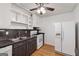Traditional kitchen features updated countertops, white cabinets, and stainless-steel appliances at 3123 Deshong Dr, Stone Mountain, GA 30087