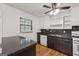 Bright kitchen featuring stainless appliances, dark countertops, and ample storage at 3123 Deshong Dr, Stone Mountain, GA 30087