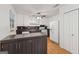Eat-in kitchen showcases a center island, white cabinets, and hardwood flooring at 3123 Deshong Dr, Stone Mountain, GA 30087