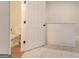Basement bathroom featuring ceramic tile flooring and toilet at 5674 Mountain Cres, Stone Mountain, GA 30087