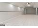 Open basement space featuring ceramic tile flooring, recessed lighting, and neutral-toned walls at 5674 Mountain Cres, Stone Mountain, GA 30087