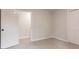 Carpeted bedroom featuring an adjoining bedroom and large closet at 5674 Mountain Cres, Stone Mountain, GA 30087