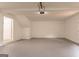 Spacious two car garage featuring freshly painted walls and floors, and an updated garage door opener at 5674 Mountain Cres, Stone Mountain, GA 30087