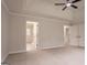 Spacious main bedroom featuring a tray ceiling, ceiling fan, and neutral carpet at 5674 Mountain Cres, Stone Mountain, GA 30087