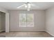 Light, bright bedroom with carpet and a large window at 901 Chadwick Park Dr, Lawrenceville, GA 30045