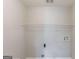 Laundry room with white walls and utility connections at 901 Chadwick Park Dr, Lawrenceville, GA 30045