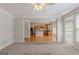 Inviting living room with an open floor plan leading to the kitchen area at 901 Chadwick Park Dr, Lawrenceville, GA 30045