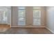 Comfortable room with neutral carpet and large windows offering plenty of natural light at 901 Chadwick Park Dr, Lawrenceville, GA 30045