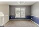 Spacious bedroom with neutral carpet and a bright window offering natural light at 1006 Eagle Vw, Lawrenceville, GA 30044