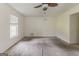 Bedroom with neutral carpet, window, and ceiling fan at 1006 Eagle Vw, Lawrenceville, GA 30044