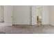 Bedroom featuring neutral walls, carpet, and two doorways to other rooms at 1006 Eagle Vw, Lawrenceville, GA 30044