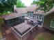 Backyard deck with gazebo, hot tub, outdoor furniture, and a wooded view at 11940 Wexford Club Dr, Roswell, GA 30075
