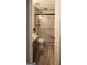 Modern bathroom features glass door shower with seat, granite countertop and wood laminate floor at 11940 Wexford Club Dr, Roswell, GA 30075